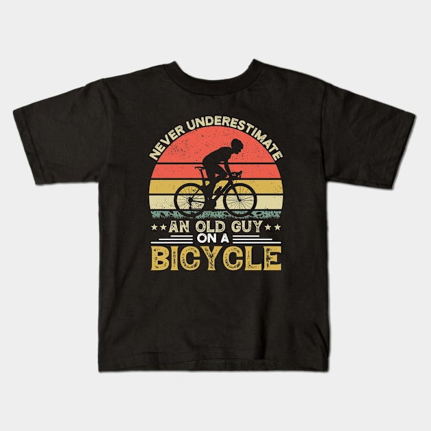 Never Underestimate An Old Guy On A Bicycle Rider Kids T-Shirt by ChrifBouglas